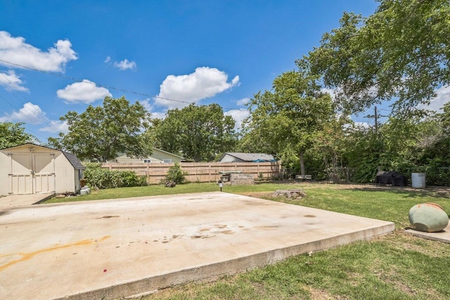 2008 Paige St, Georgetown, TX 78626 - fenced backyard with a storage unit and a patio