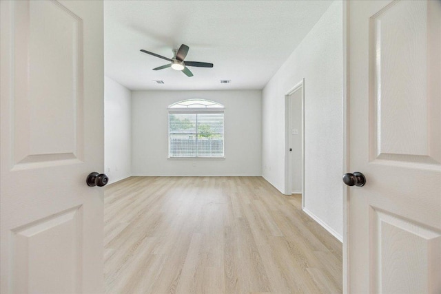 3659 Nolan Ryan Blvd, Round Rock, TX 78665 - unfurnished room with wood finished floors and a ceiling fan