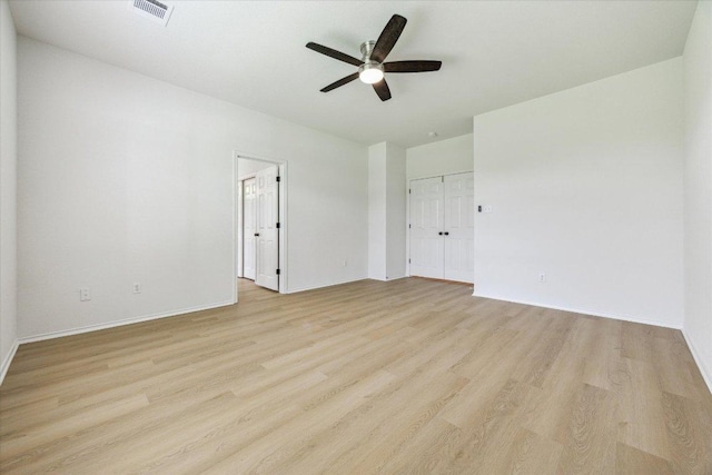 3659 Nolan Ryan Blvd, Round Rock, TX 78665 - empty room featuring a ceiling fan and light wood-style floors