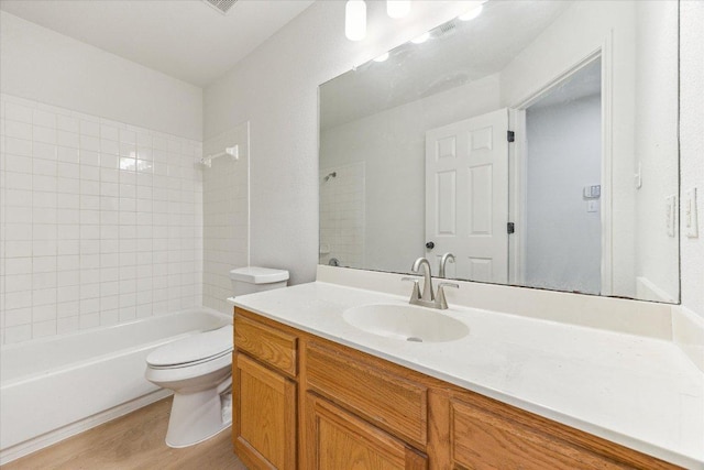 3659 Nolan Ryan Blvd, Round Rock, TX 78665 - full bathroom with vanity, wood finished floors, and bathing tub / shower combination