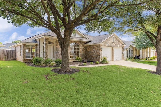 3659 Nolan Ryan Blvd, Round Rock, TX 78665 - view of front of home with brick siding, a garage, driveway, and a shingled roof