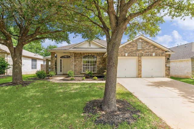 3659 Nolan Ryan Blvd, Round Rock, TX 78665 - ranch-style house with an attached garage, a front lawn, driveway, and brick siding