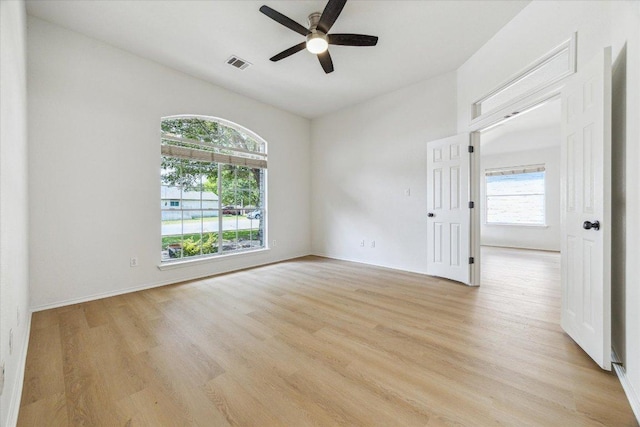 3659 Nolan Ryan Blvd, Round Rock, TX 78665 - empty room with light wood finished floors and ceiling fan