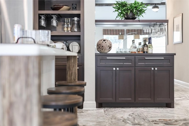 3605 Bunyan Cir, Lago Vista, TX 78645 - indoor dry bar with baseboards