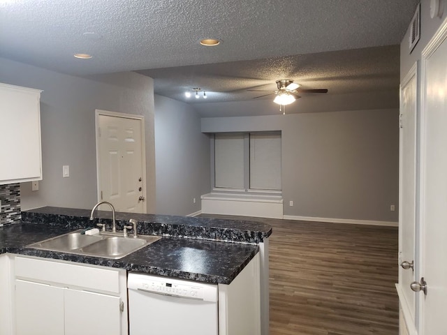 1221 W Hopkins St Unit 11, San Marcos, TX 78666 - kitchen featuring white dishwasher, ceiling fan, a textured ceiling, a peninsula, and dark wood-type flooring
