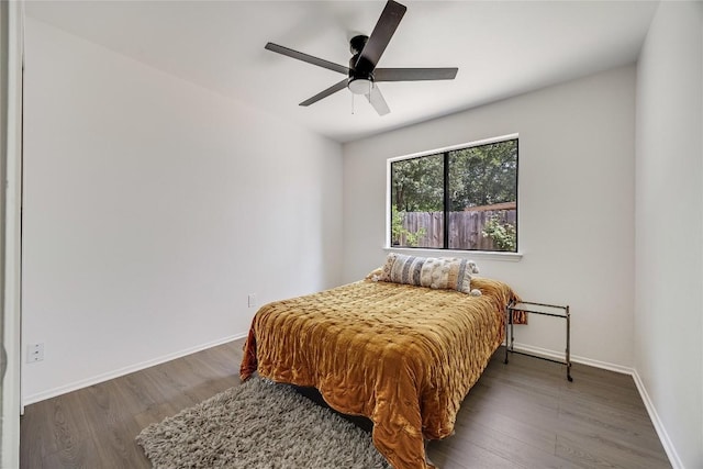 1406 Byers Ln, Austin, TX 78753 - bedroom with wood finished floors and a ceiling fan