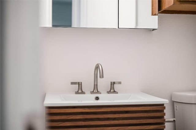 1406 Byers Ln, Austin, TX 78753 - bathroom featuring vanity and toilet