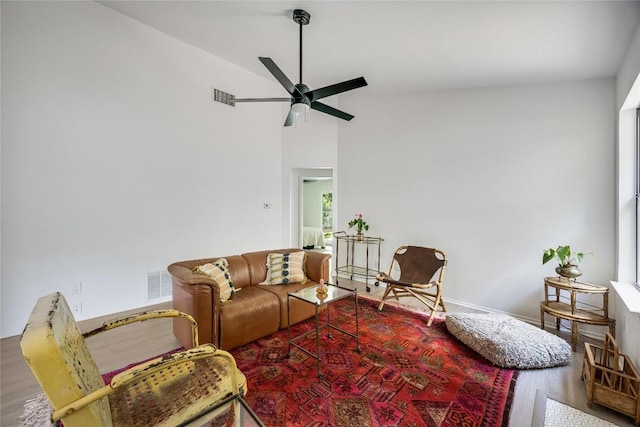 1406 Byers Ln, Austin, TX 78753 - living room with wood finished floors, ceiling fan, and vaulted ceiling