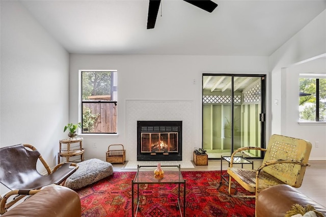 1406 Byers Ln, Austin, TX 78753 - living room featuring a ceiling fan and a glass covered fireplace