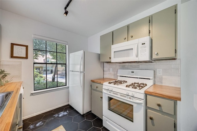 1406 Byers Ln, Austin, TX 78753 - kitchen featuring white appliances, butcher block counters, backsplash, dark tile patterned flooring, and gray cabinets