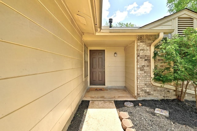 4614 Ganymede Dr, Austin, TX 78727 - property entrance with brick siding