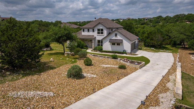 1621 Angolo, New Braunfels, TX 78132 - view of front of home featuring stucco siding, concrete driveway, a front yard, roof with shingles, and an attached garage