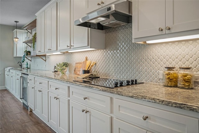 1621 Angolo, New Braunfels, TX 78132 - kitchen featuring under cabinet range hood, black electric cooktop, wine cooler, open shelves, and white cabinetry