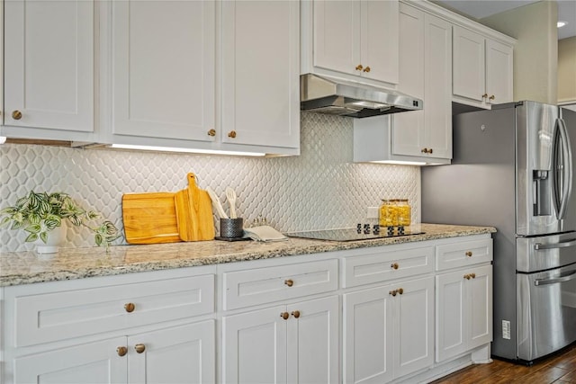 1621 Angolo, New Braunfels, TX 78132 - kitchen featuring under cabinet range hood, black electric cooktop, stainless steel refrigerator with ice dispenser, white cabinetry, and dark wood-style floors