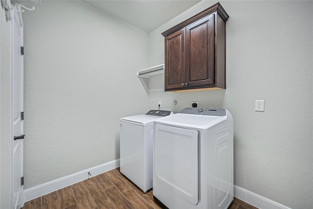 1621 Angolo, New Braunfels, TX 78132 - laundry area with cabinet space, washing machine and dryer, and dark wood-style floors