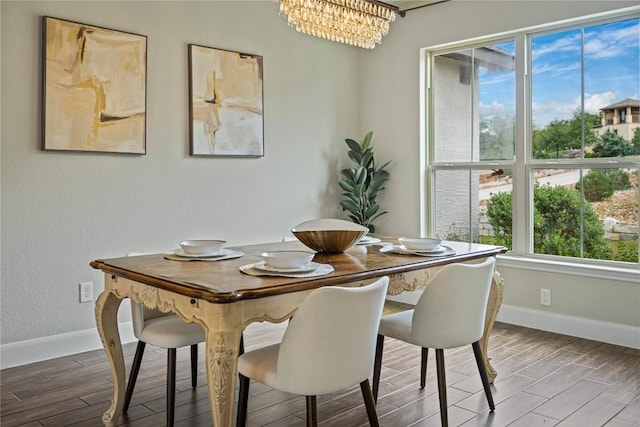 1621 Angolo, New Braunfels, TX 78132 - dining room featuring plenty of natural light, a chandelier, and wood finished floors