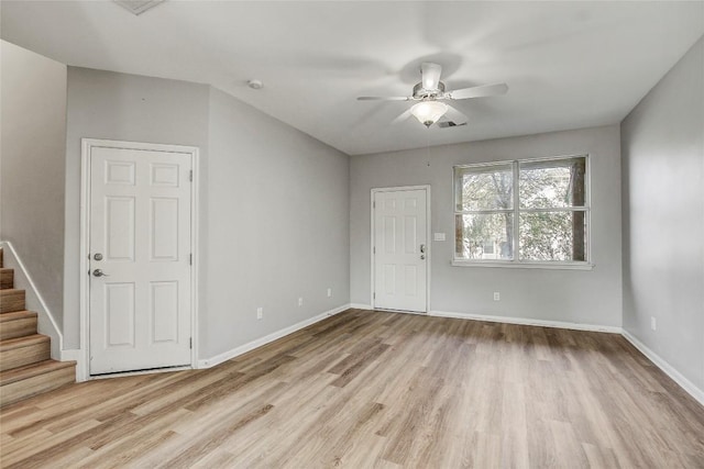 512 Eberhart Ln Unit 1207, Austin, TX 78745 - entrance foyer featuring wood finished floors, stairway, and a ceiling fan