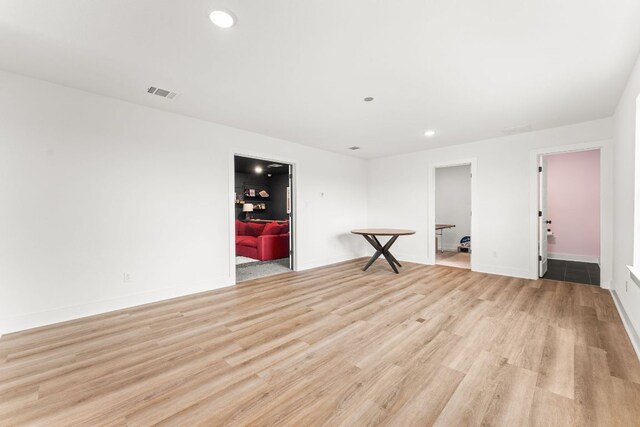 518 Toyah Dr, Dripping Springs, TX 78620 - spare room featuring light wood-type flooring and recessed lighting