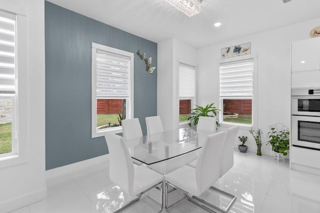123 Zacate St, Elgin, TX 78621 - dining room with recessed lighting and baseboards
