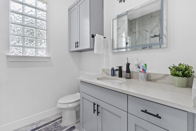 123 Zacate St, Elgin, TX 78621 - full bathroom with marble finish floors, vanity, a marble finish shower, and plenty of natural light