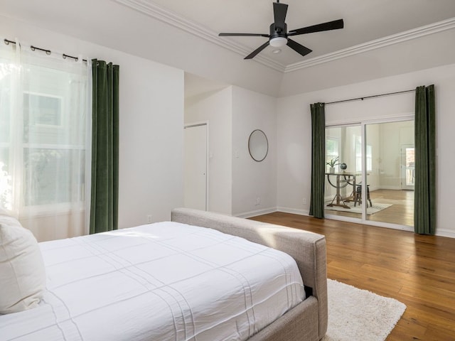 10310 Holme Lacey Ln, Austin, TX 78750 - bedroom featuring crown molding, wood finished floors, and a ceiling fan