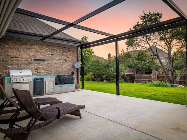 10310 Holme Lacey Ln, Austin, TX 78750 - patio terrace at dusk featuring area for grilling and a patio
