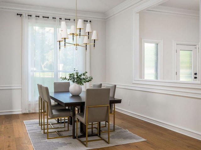 10310 Holme Lacey Ln, Austin, TX 78750 - dining room with a chandelier, hardwood / wood-style flooring, and ornamental molding