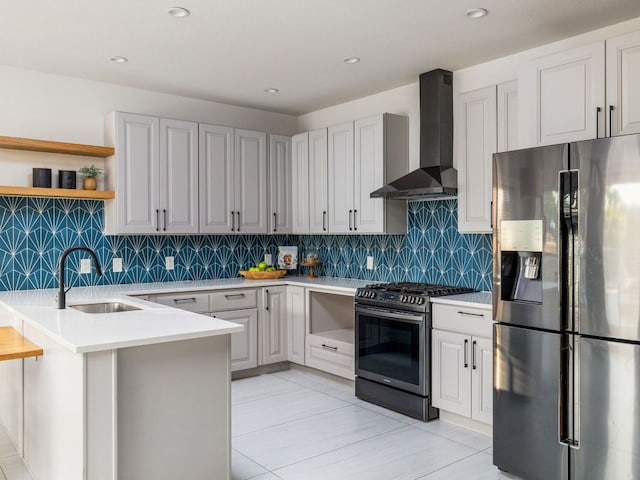 10310 Holme Lacey Ln, Austin, TX 78750 - kitchen featuring stainless steel appliances, wall chimney range hood, open shelves, light countertops, and decorative backsplash