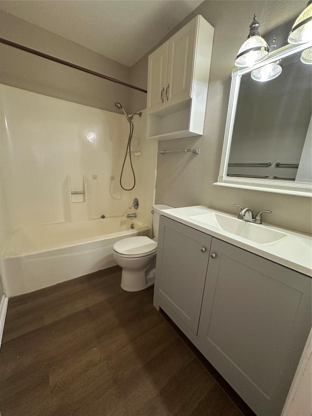1210 Hi Stirrup Unit 201, Horseshoe Bay, TX 78657 - full bath with wood finished floors, vanity, and bathing tub / shower combination