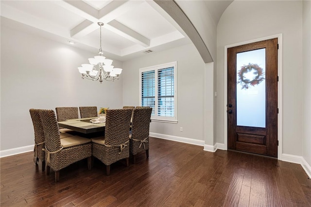 201 Glenfiddich Ln, Austin, TX 78738 - dining space with a chandelier, arched walkways, dark wood finished floors, coffered ceiling, and beamed ceiling