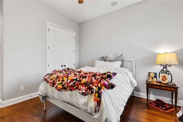 201 Glenfiddich Ln, Austin, TX 78738 - bedroom featuring a closet, wood finished floors, and a ceiling fan