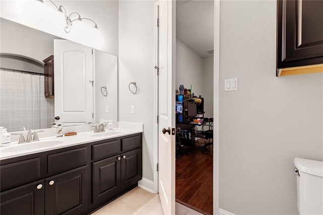 201 Glenfiddich Ln, Austin, TX 78738 - full bath featuring double vanity and tile patterned floors