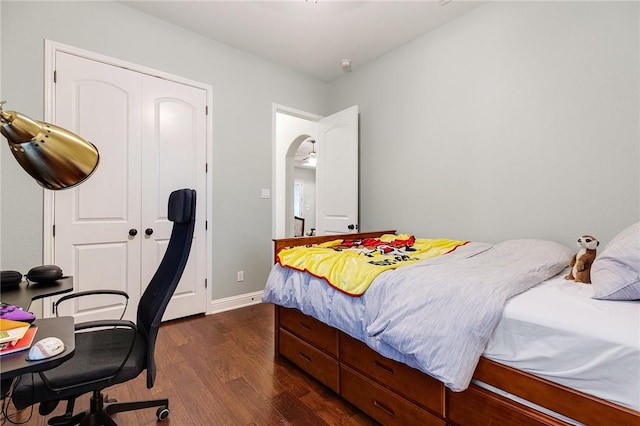201 Glenfiddich Ln, Austin, TX 78738 - bedroom featuring dark wood-style floors, a closet, and an office area