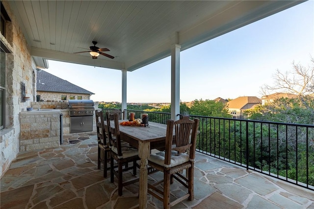 201 Glenfiddich Ln, Austin, TX 78738 - view of patio / terrace with a ceiling fan, exterior kitchen, and outdoor dining area