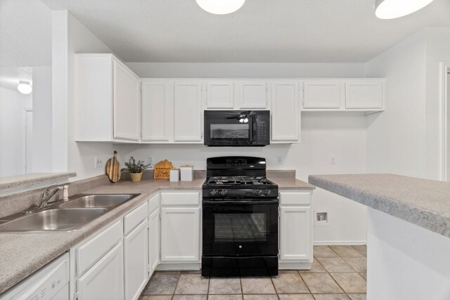 800 Saunders Dr, Round Rock, TX 78664 - kitchen with black appliances, white cabinets, and light countertops