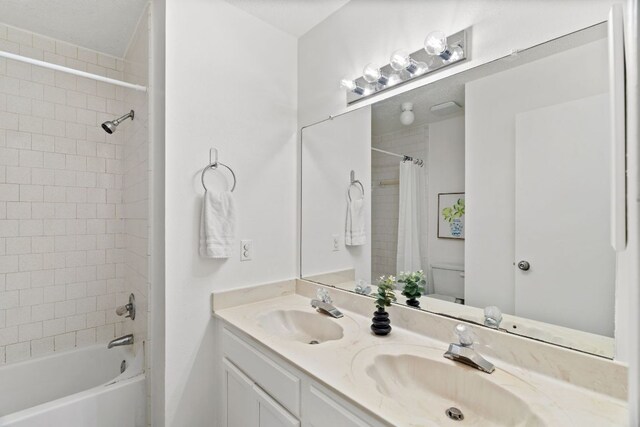 800 Saunders Dr, Round Rock, TX 78664 - full bath featuring double vanity and shower / bath combo with shower curtain