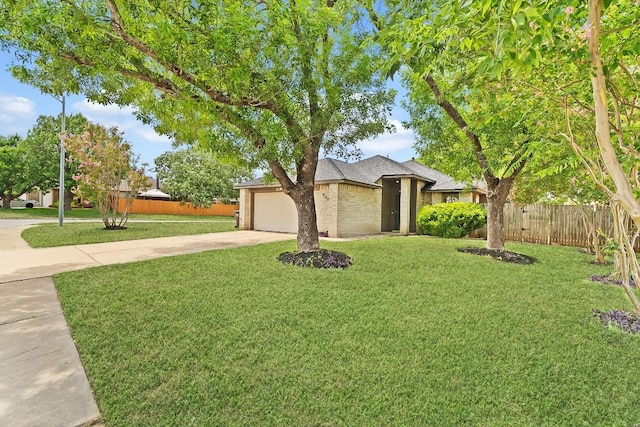 800 Saunders Dr, Round Rock, TX 78664 - view of front of home with concrete driveway, a garage, and a shingled roof