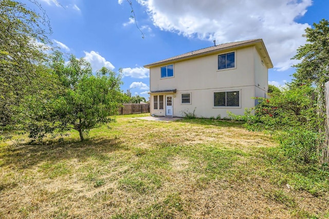 1301 Still Meadow Dr, Leander, TX 78641 - rear view of house featuring a fenced backyard, stucco siding, and a patio