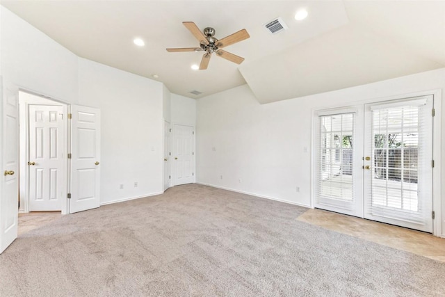 4306 S Summercrest Loop, Round Rock, TX 78681 - unfurnished bedroom with carpet floors, access to exterior, vaulted ceiling, french doors, and recessed lighting