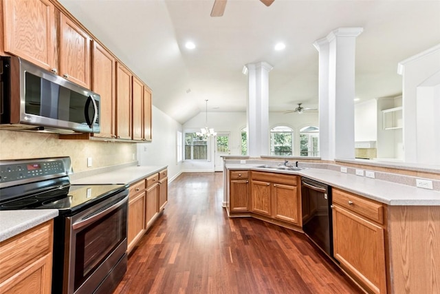 4306 S Summercrest Loop, Round Rock, TX 78681 - kitchen featuring appliances with stainless steel finishes, a ceiling fan, dark wood-type flooring, ornate columns, and lofted ceiling