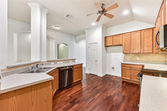 4306 S Summercrest Loop, Round Rock, TX 78681 - kitchen with stainless steel appliances, arched walkways, ceiling fan, dark wood-style flooring, and light countertops