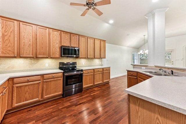 4306 S Summercrest Loop, Round Rock, TX 78681 - kitchen with appliances with stainless steel finishes, vaulted ceiling, backsplash, a ceiling fan, and dark wood finished floors