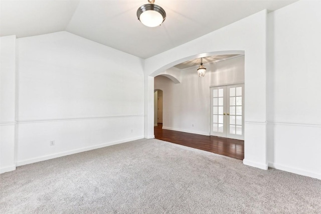4306 S Summercrest Loop, Round Rock, TX 78681 - unfurnished room with carpet, arched walkways, french doors, and vaulted ceiling