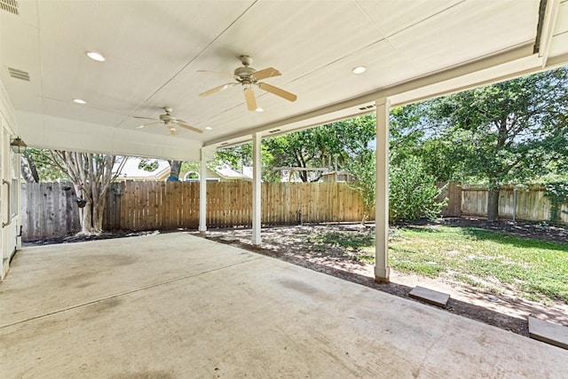4306 S Summercrest Loop, Round Rock, TX 78681 - fenced backyard featuring a ceiling fan and a patio area