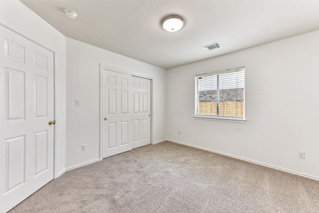 4306 S Summercrest Loop, Round Rock, TX 78681 - unfurnished bedroom featuring carpet floors and a closet