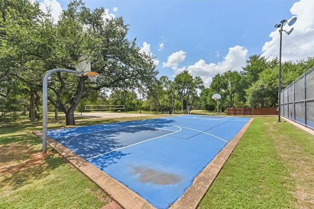 4306 S Summercrest Loop, Round Rock, TX 78681 - view of basketball court featuring community basketball court, volleyball court, and view of wooded area