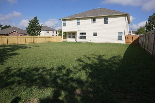 18801 Edinburgh Castle Rd, Pflugerville, TX 78660 - back of house with a fenced backyard