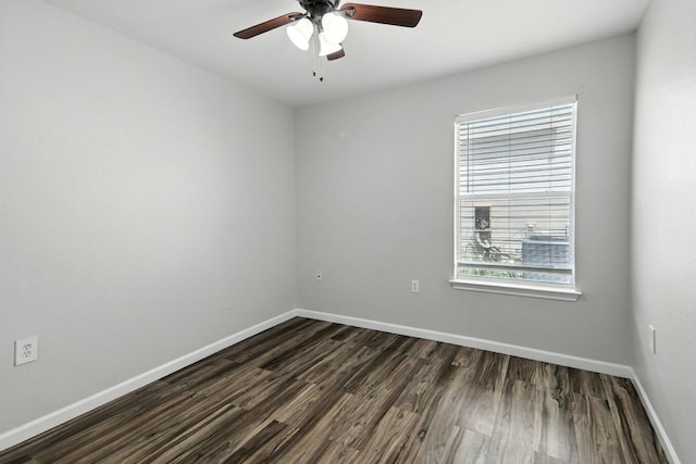 12613 Paloma Blanca Way, Del Valle, TX 78617 - spare room with ceiling fan and dark wood-type flooring