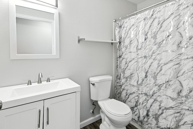 12613 Paloma Blanca Way, Del Valle, TX 78617 - bathroom featuring vanity, wood finished floors, and a shower with shower curtain