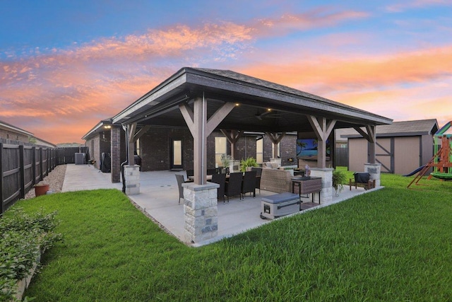 5106 La Piedra Ln, Killeen, TX 76549 - back of house featuring a gazebo, a patio, a playground, and an outdoor hangout area